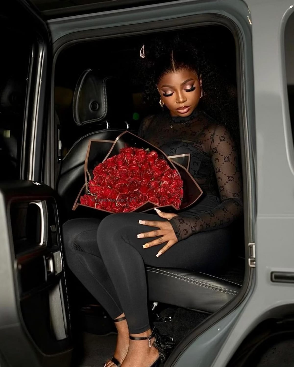 A Supreme Luxe bouquet carried after dark in Cape Town
